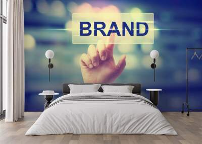 Hand pressing BRAND button Wall mural