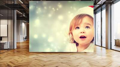 Happy Toddler girl with Santa hat Wall mural