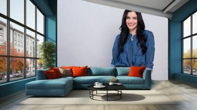 Happy young woman on a gray background Wall mural