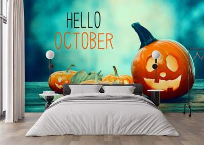 Hello October with pumpkins on a spooky forest at night Wall mural