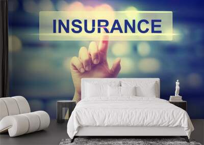 Insurance concept with hand pressing a button Wall mural