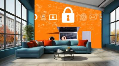 Internet network security concept with person using a laptop computer Wall mural