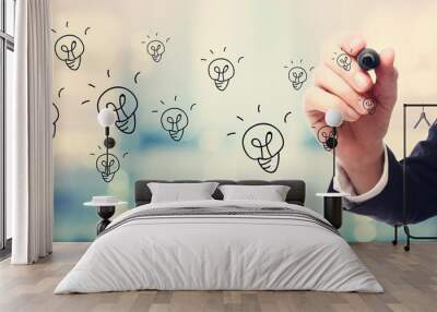 Light Bulb concept with businessman Wall mural