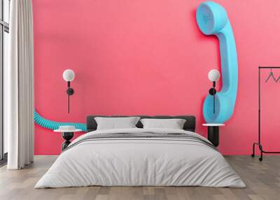 Retro phone on a pink paper background Wall mural