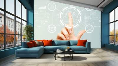 Smart industry concept with hand pressing a button on a technology screen Wall mural