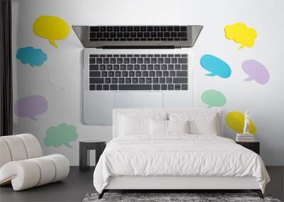 Social media concept with message bubbles and a laptop computer Wall mural