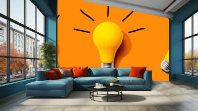 Three yellow light bulbs - flat lay from above Wall mural