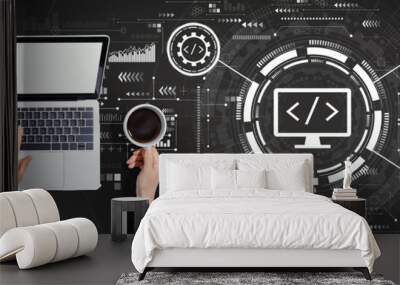 Web development concept with person using a laptop computer Wall mural