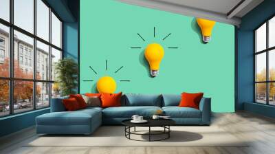 Yellow light bulb pattern with shadow Wall mural