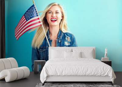 Young woman holding American flag Wall mural