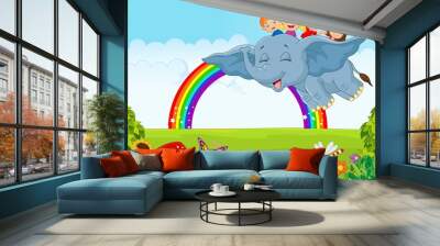 Cartoon little kid on the rainbow Wall mural