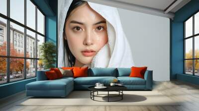 Beauty portrait skin care concept | Beautiful Asian woman with water drops on her face, wrapped Wall mural