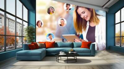 Beautiful woman with tablet, communication Wall mural