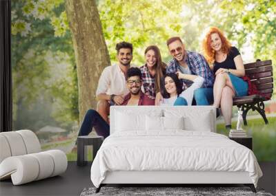 Group of young people having fun outdoors  Wall mural