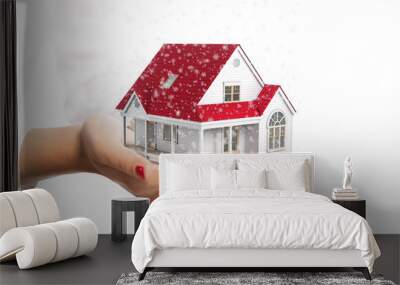 hands holding a small house isolated on white Wall mural