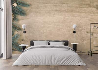 Christmas background with decorated fir tree branch border on vintage wood, flat lay, panoramic toned image Wall mural