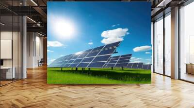 Solar panels in a green field under a blue sky. Wall mural