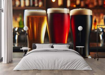 3 drinks, dark, red and light beer served in a dark bar Wall mural