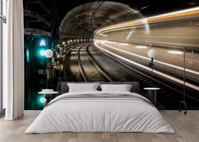 Railway tunnel with train in motion Wall mural