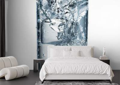 Glass of water with ice. With clipping path Wall mural