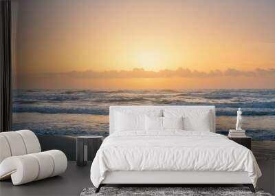 Beautiful shot of a beach against ocean waves at South Padre Island, Texas at sunrise Wall mural