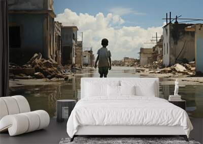 little boy walking on the street after flood in north africa Wall mural