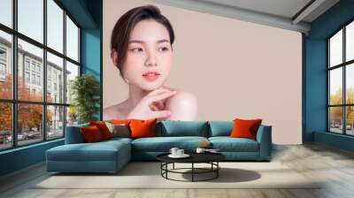 Attractive young Asian woman with fresh skin. Face care, facial treatment, , woman beauty skin isolated on white background. cosmetology, beauty skin and cosmetic concept Wall mural