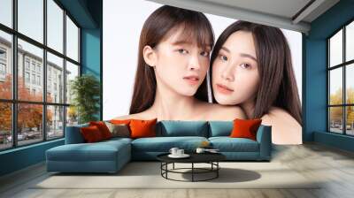 Beauty portrait of two beautiful young Asian girls Wall mural