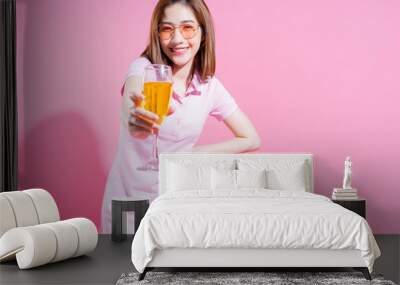 Full length photo of young Asian girl on pink background Wall mural