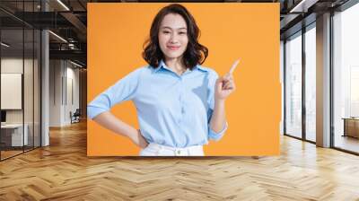 Photo of young Asian woman on background Wall mural