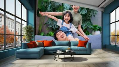 Portrait of young Asian family Wall mural