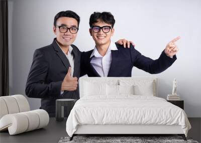 Two Asian businessman posing on white background Wall mural