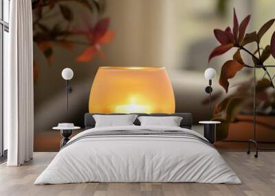 A translucent frosted glass candle holder, glowing softly with a flickering candle inside Wall mural