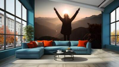 Celebrating success on a mountain top, mountain peak Wall mural