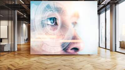 The double exposure image of the businessman looking up during sunrise overlay with cityscape image and futuristic hologram. The concept of modern life, technology, iris scanner and internet of things Wall mural