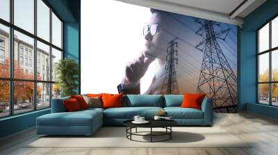 the double exposure image of the engineer thinking overlay with the high voltage pole image. Wall mural