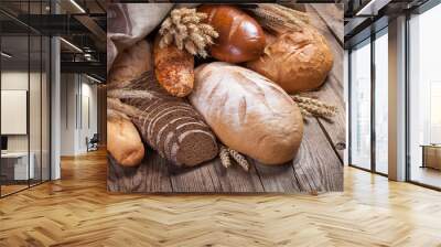 Bread and ears on an old table Wall mural