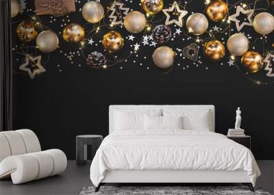 New year 2021. Merry Christmas and Happy Holidays greeting card. Christmas composition. Gold and silver decorations on black background. Winter, new year concept. Flat lay, top view Wall mural