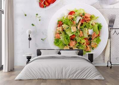 Caesar Salad with Salmon. Fish menu. Seafood - salmon. Top view, overhead, copy space Wall mural