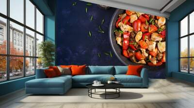 Chicken stir fry. Meat stew with vegetables sweet pepper, onion, tomato, eggplant  in soy sauce gravy. Ketogenic diet. Top view, overhead, copy space Wall mural