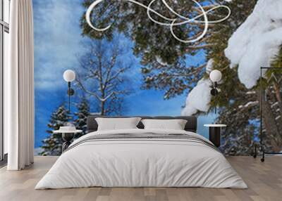 Winter landscape with fresh snow in a mountain forest and text Merry Christmas. Calligraphy lettering Wall mural