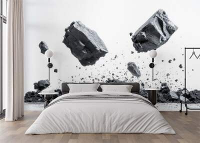 Falling rocks on white background. Black charcoal or coal on white background Wall mural