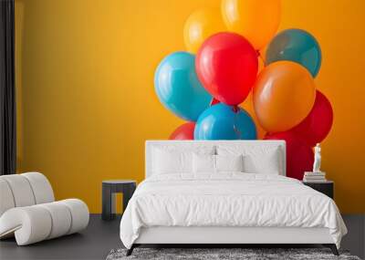 party birthday celebration colorful balloons on orange background Wall mural