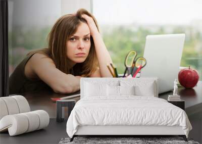 Beautiful woman working at the computer Wall mural