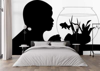 Cute small girl looking  at her fish in the aquarium silhouette Wall mural