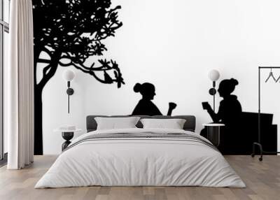 Silhouettes of girls in garden drinking coffee Wall mural