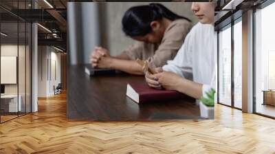   Religious young woman praying to God in the morning, spirtuality and religion, Religious concepts Wall mural