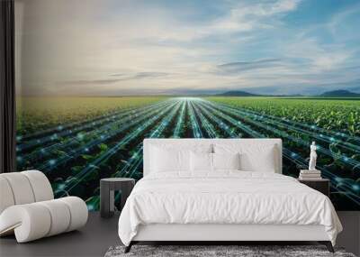 A futuristic view of an expansive field showcasing smart farming technology under a vibrant sky at sunrise. Wall mural