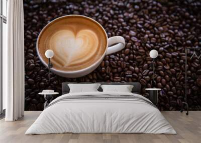 cup of coffee and coffee beans  on dark background, top view Wall mural