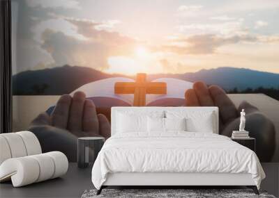 Human hands open palm up worship, open Bible, script in blur with focus on palm cross,  Eucharist Therapy Bless God Helping Repent Catholic Easter Lent Mind Pray. Wall mural